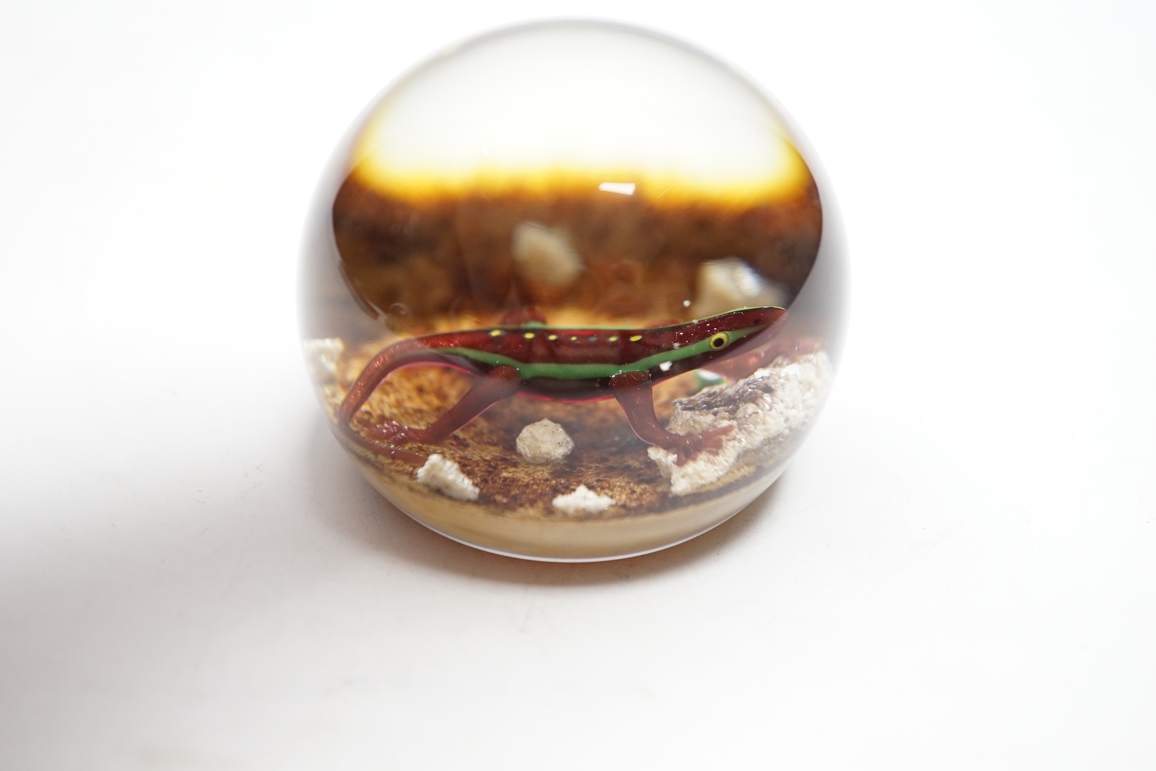 A Paul Ysart ‘salamander’ glass paperweight, Harland period, ‘PY’ cane, pebble ground, 6.5cm